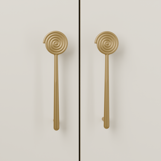 Solara Pull in Brushed Brass (PVD) installed on warm almond cabinetry - vertical pair, square view