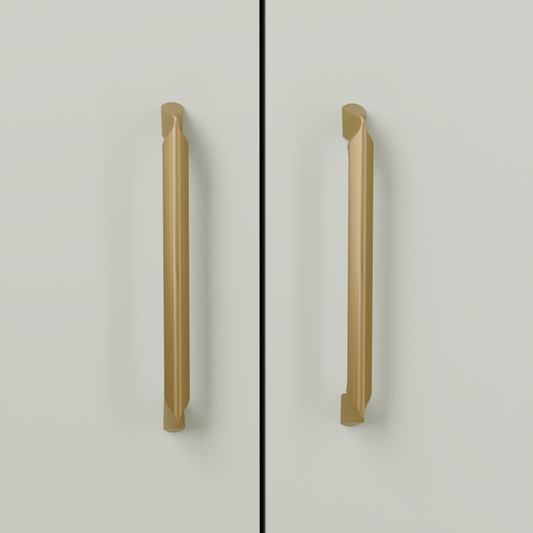 Vega Pull in Brushed Brass (PVD) installed on greyed sage cabinetry - vertical pair, square view