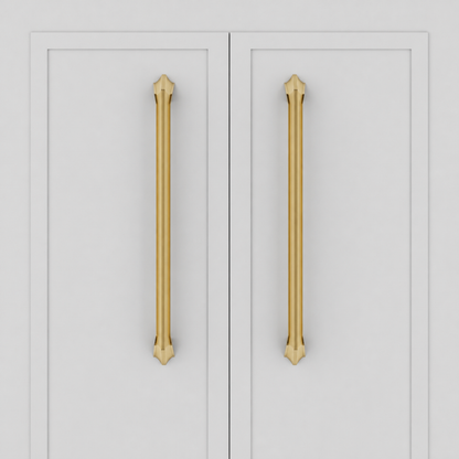 Spica Pull in Brushed and Matte Gold PVD installed on cabinetry - straight view