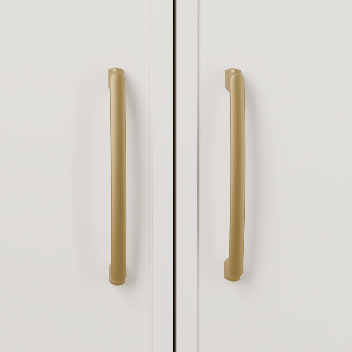Castor Pull in Brushed Brass (PVD) installed on warm chalk cabinetry - vertical pair, square view