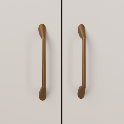 Lyra Pull in Warm Bronze (PVD) installed on putty blush cabinetry - vertical pair, square view