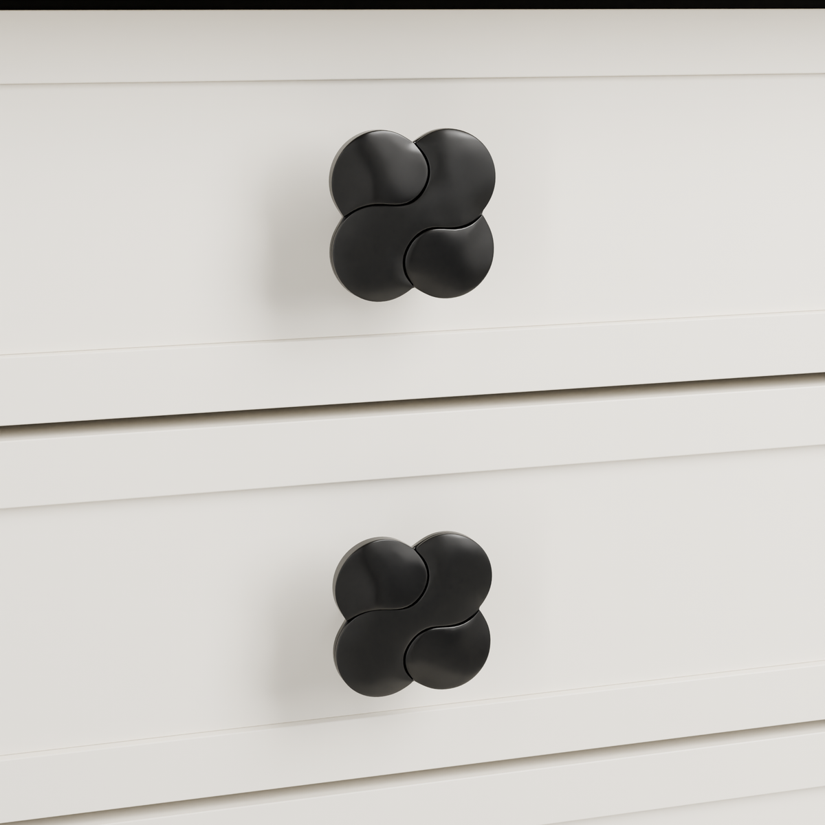 Saiph Knob in Polished Black + Matte Black installed on warm chalk cabinetry - drawer detail, square view