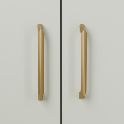 Vega Pull in Brushed Brass (PVD) installed on greyed sage cabinetry - vertical pair, square view